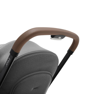 The Joolz Aer stroller by Mega babies, has a trendy leather push bar.