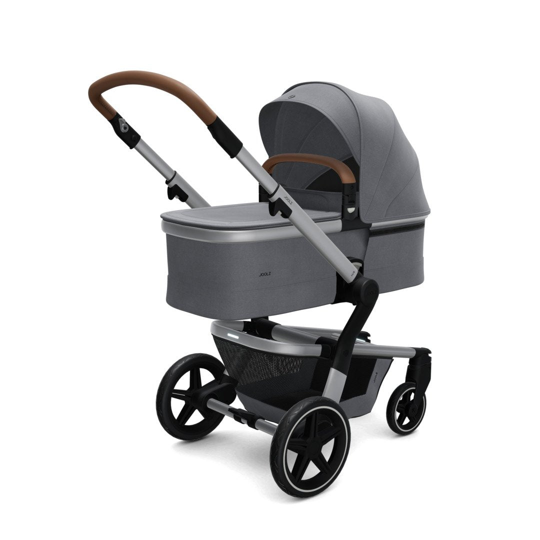 Joolz Hub Bassinet Swaddles Baby