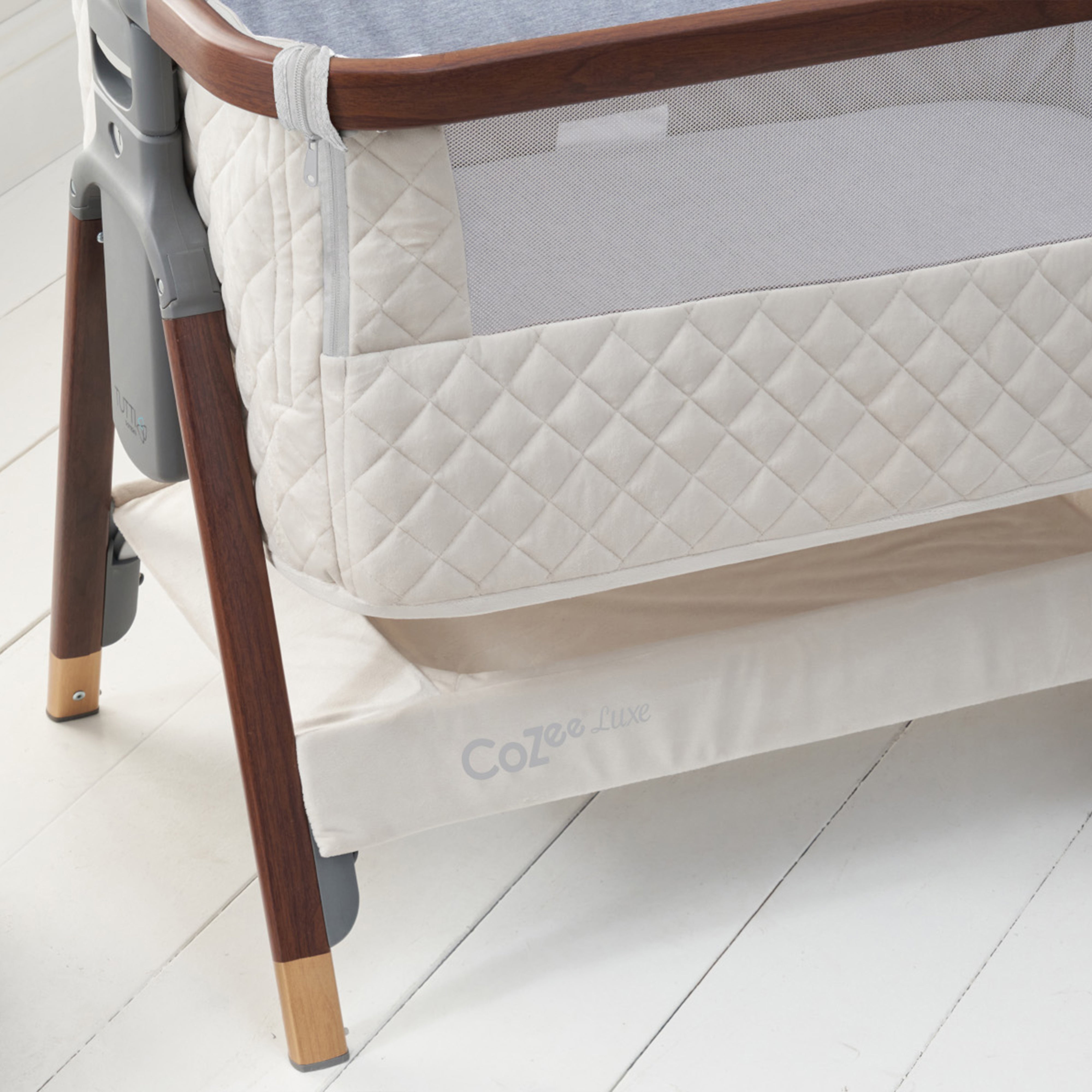 Tutti Bambini CoZee Luxe Bedside Crib Swaddles Baby