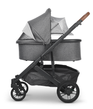 Load image into Gallery viewer, Mega babies&#39; UPPAbaby CRUZ V2 stroller features a protective sun shield.
