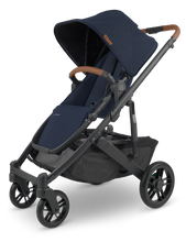 Load image into Gallery viewer, You can get the UPPAbaby CRUZ V2 from Mega babies in a neutral navy blue shade.

