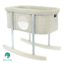 Load image into Gallery viewer, Choose Mega babies’ Green Frog bassinet in a neutral sand color, with a circle pattern.
